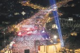 Crowds wave flags during a ceremony commemorating the victims of the July 15 coup attempt, Istanbul, July 15, 2017.