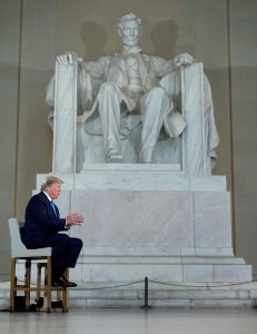 U.S. President Donald Trump participates in a live Fox News Channel virtual town hall about the response to the coronavirus pandemic, as he sits in front of the statue of former President Abraham Lincoln inside the Lincoln Memorial in Washington, D.C., U.S., May 3, 2020. (Reuters Photo)